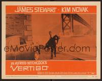 1z643 VERTIGO LC #7 '58 Alfred Hitchcock, James Stewart holds unconscious Kim Novak under bridge!