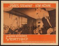 1z644 VERTIGO LC #8 '58 Alfred Hitchcock, standing James Stewart glares at blonde Kim Novak!