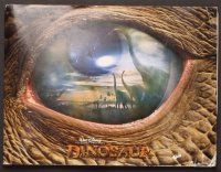 2d240 DINOSAUR presskit '00 Disney, great image of prehistoric world in dinosaur eye!