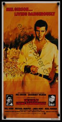 2j577 YEAR OF LIVING DANGEROUSLY Aust daybill '83 Peter Weir, great art of Mel Gibson by Stapleton