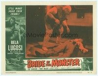 3a257 BRIDE OF THE MONSTER LC #3 '56 Ed Wood, Tor Johnson stands over beaten opponent in lab!