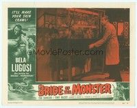 3a253 BRIDE OF THE MONSTER LC #8 '56 Ed Wood, full-length Bela Lugosi stands in front of equipment!