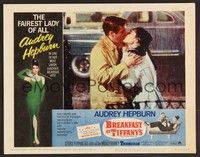3d298 BREAKFAST AT TIFFANY'S LC #1 R65 George Peppard kisses Audrey Hepburn in the rain!