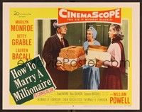3d031 HOW TO MARRY A MILLIONAIRE LC #8 '53 Powell gives gifts to Marilyn Monroe & Lauren Bacall!