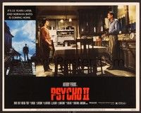 3d518 PSYCHO II LC #5 '83 Anthony Perkins as Norman Bates talking to Meg Tilly in kitchen!