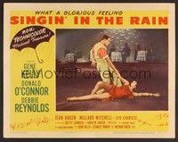 3d015 SINGIN' IN THE RAIN LC #7 '52 classic image of Gene Kelly dancing with sexiest Cyd Charisse!