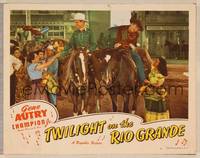 3d667 TWILIGHT ON THE RIO GRANDE LC #7 '47 Gene Autry & Sterling Holloway on horseback get flowers!