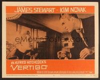 3d674 VERTIGO LC #8 '58 Alfred Hitchcock, standing James Stewart glares at blonde Kim Novak!
