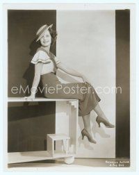 3s405 ROCHELLE HUDSON 8x10 still '30s wearing cool dress and hat, sitting on a box!