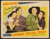 3v114 UNDER FIESTA STARS signed LC '41 by Gene Autry, who's with Smiley Burnette & pretty girls!