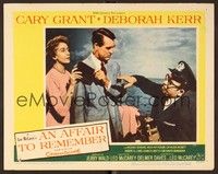 4k029 AFFAIR TO REMEMBER LC #7 '57 Cary Grant & Deborah Kerr take negative from photographer!