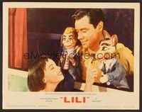 4k366 LILI LC #8 R64 close up of Leslie Caron watching Mel Ferrer with puppets!