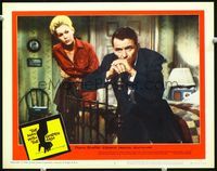 4k381 MAN WITH THE GOLDEN ARM LC #6 R60 Kim Novak looks at Frank Sinatra sitting on bed!