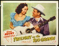 4k560 TWILIGHT ON THE RIO GRANDE LC #2 '47 close up of Gene Autry with his guitar & Adele Mara!