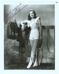5g308 ELLA RAINES signed 8x10 REPRO still '80s sexy cowgirl portrait in skimpy outfit by saddle!