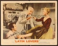 5g051 LATIN LOVERS signed LC #2 '53 by Ricardo Montalban, who's rubbing Lana Turner's foot!