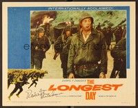 5g052 LONGEST DAY signed LC #4 '62 by Robert Mitchum, who's standing full-length in uniform!