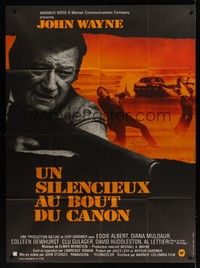 5h591 McQ French 1p '74 John Sturges, different art of John Wayne by Georges Kerfyser!