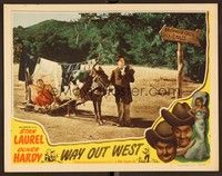 5z588 WAY OUT WEST LC #7 R47 Stan Laurel leads mule dragging Oliver Hardy wearing a towel!