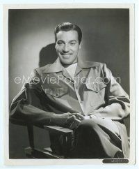 6a098 CESAR ROMERO 8x10 still '30s great smiling seated portrait with hands clasped!
