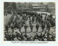 6a161 EDGE OF DARKNESS 8x10 still '42 far shot of many soldiers gathered in town square!