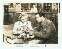6a173 EVERYTHING HAPPENS AT NIGHT 8x10.25 still '39 Ray Milland shows pretty Sonja Henie a paper!