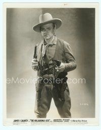 6a417 OKLAHOMA KID 8x10 still '39 full-length close up of cowboy James Cagney holding two guns!