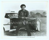 6a514 SLAUGHTER 8x10 still '72 great image of angry shotgun-blasting Jim Brown standing by car!