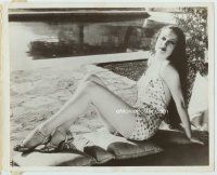 6k266 DOROTHY LAMOUR 8x10 news photo '30s full-length seated on pillow by pool in sexy outfit!