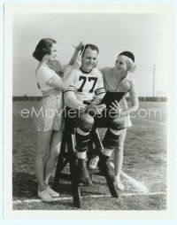6m428 RED GRANGE 8x10 still '30s the football star seated between sexy girls fixing his hair!