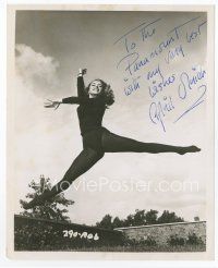 6s125 APRIL OLRICH signed 8x10 still '57 full-length portrait of the actress leaping in mid-air!