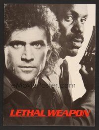 6z451 LETHAL WEAPON promo brochure '87 great close image of cop partners Mel Gibson & Danny Glover
