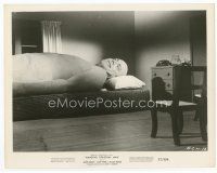 7b097 AMAZING COLOSSAL MAN 8x10 still '57 he's trying to get sleep in a way-too-small bed!