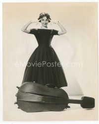 7b007 AUDREY HEPBURN 8x10 still '57 full-length standing over cello from Love in the Afternoon!