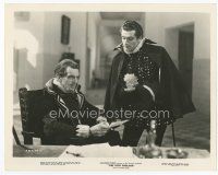 7b232 FIRE OVER ENGLAND 8x10 still '37 Raymond Massey suspects Laurence Olivier is lying to him!