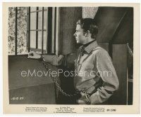 7b340 KID FROM TEXAS 8.25x10 still '49 shackled Audie Murphy looks out prison window!