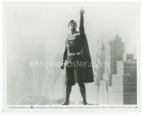 7b504 SUPERMAN CanUS 8x10 still '78 full-length Christopher Reeve in costume on top of building!