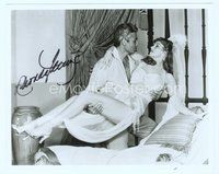 7c290 RHONDA FLEMING signed 8x10 REPRO still '90s in sexy outfit being carried by Jeff Chandler
