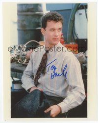 7c318 TOM HANKS signed color 8x10 REPRO still '80s sitting in front of a table with jacket in hand!