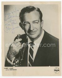 7c064 HARRY JAMES signed 8x10 publicity still '40s with his trumpet, signed to a friend!
