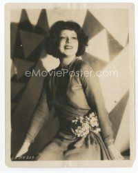 7f098 CLARA BOW 8x10 still '29 seated smiling portrait with a bouquet of flowers on her hip!