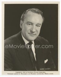 7f166 GEORGE SANDERS 8x10.25 still '58 head & shoulders portrait in suit & tie on black background