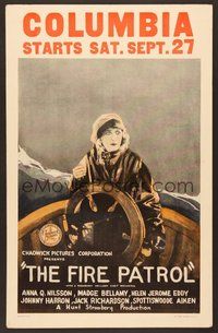 7h216 FIRE PATROL WC '24 great art of scared Anna Q. Nilsson at wheel of ship at sea!