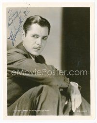 7j248 WARNER BAXTER signed 8x10 REPRO still '30s close up seated portrait with arm on his knee!