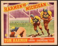 7s422 HARMON OF MICHIGAN LC '41 the great Wolverine football star in uniform with the ball!