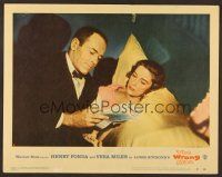 7s691 WRONG MAN LC #2 '57 Alfred Hitchcock, Henry Fonda in tuxedo with Vera Miles in bed!