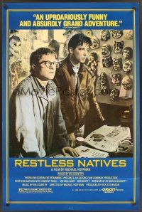 8k487 RESTLESS NATIVES  1sh '86 cool image of cast w/wall of masks!