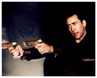 8s085 NICHOLAS CAGE signed color 8x10 REPRO still '00s cool c/u poitning two guns from Face/Off!