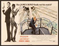 8t757 VIEW TO A KILL English LC '85 Roger Moore as James Bond on stairs with gun drawn!