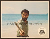 8t377 HELL IN THE PACIFIC LC #7 '68 Toshiro Mifune holding sharp stick, directed by John Boorman